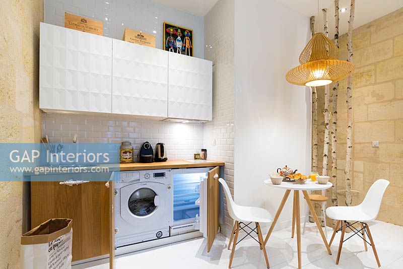 Integrated appliances in open plan kitchen