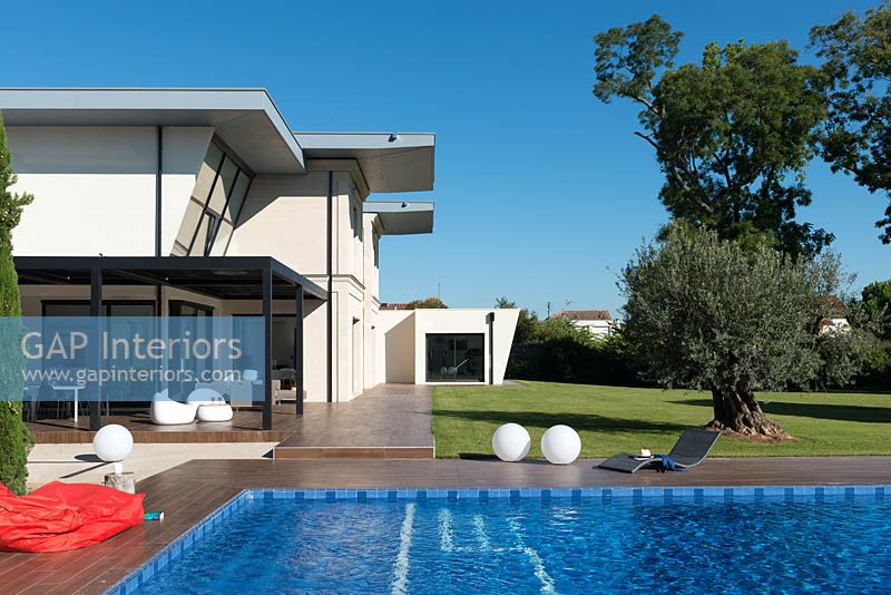 Contemporary house and garden with pool