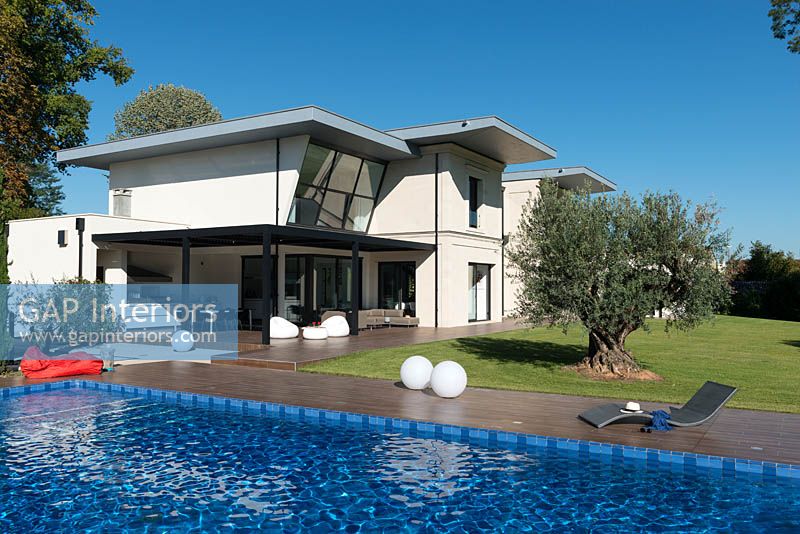 Contemporary house and garden with pool