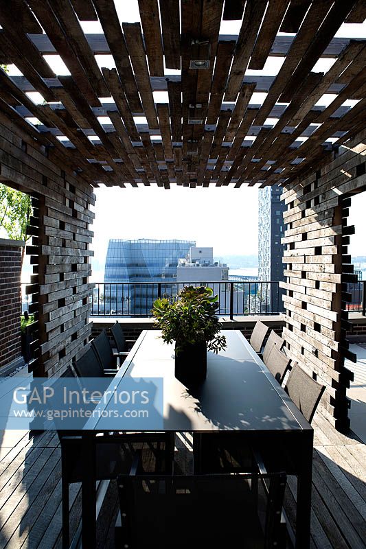 Outdoor dining area with city view