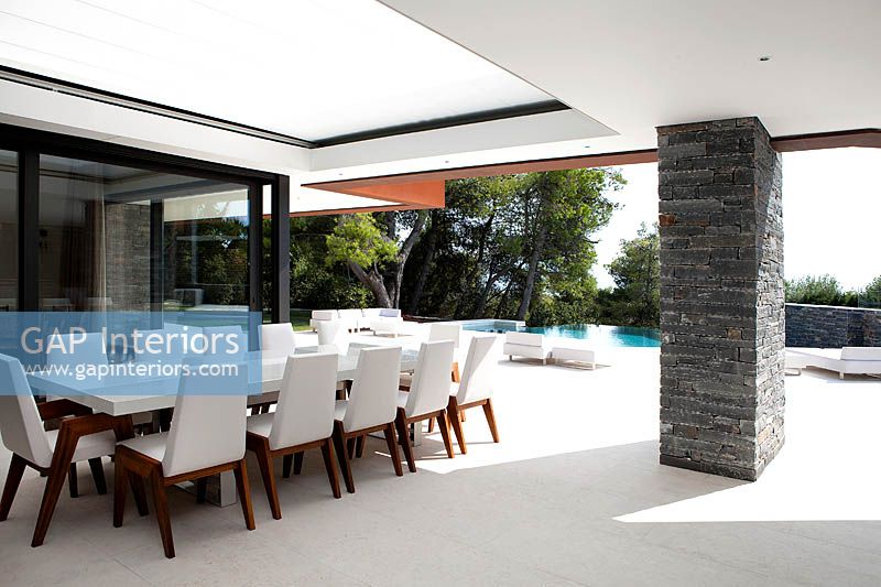 Outdoor dining area by house