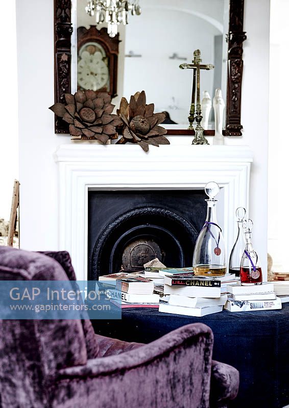 Ornate mirror over fireplace