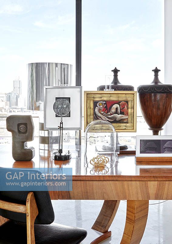 Art and accessories display on dining table
