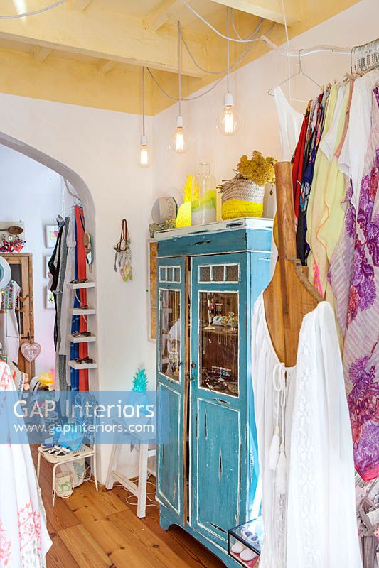 Shop interior filled with clothing and homeware
