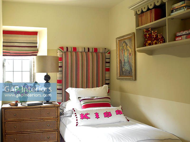 Patterned headboard and soft furnishings