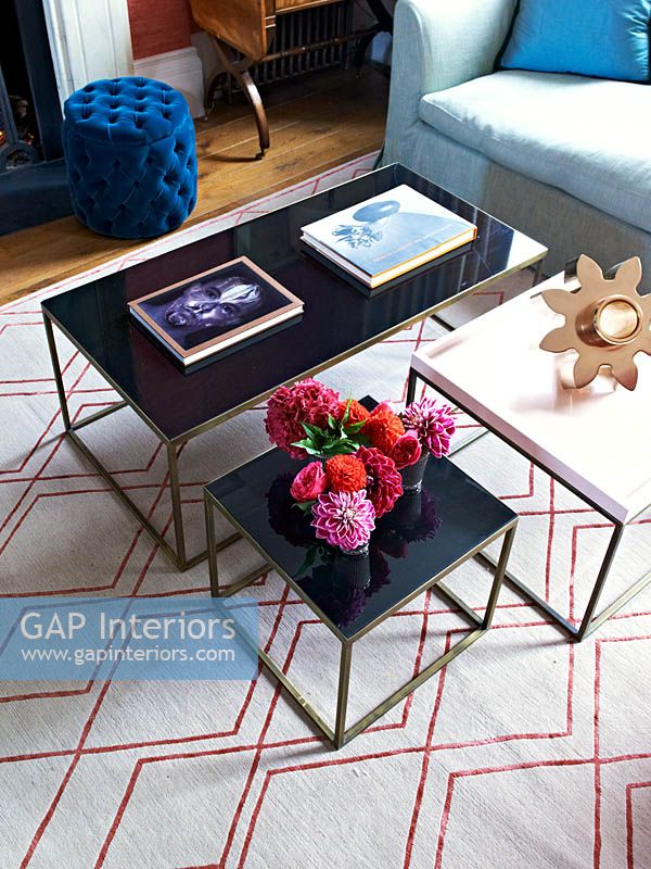 Metal coffee tables on patterned rug
