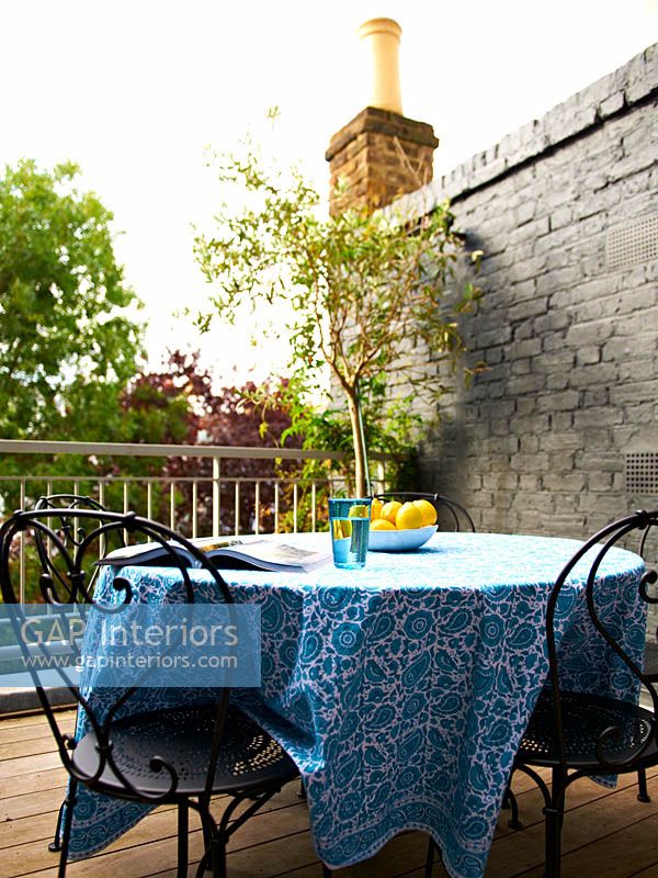 Patterned tablecloth on garden table