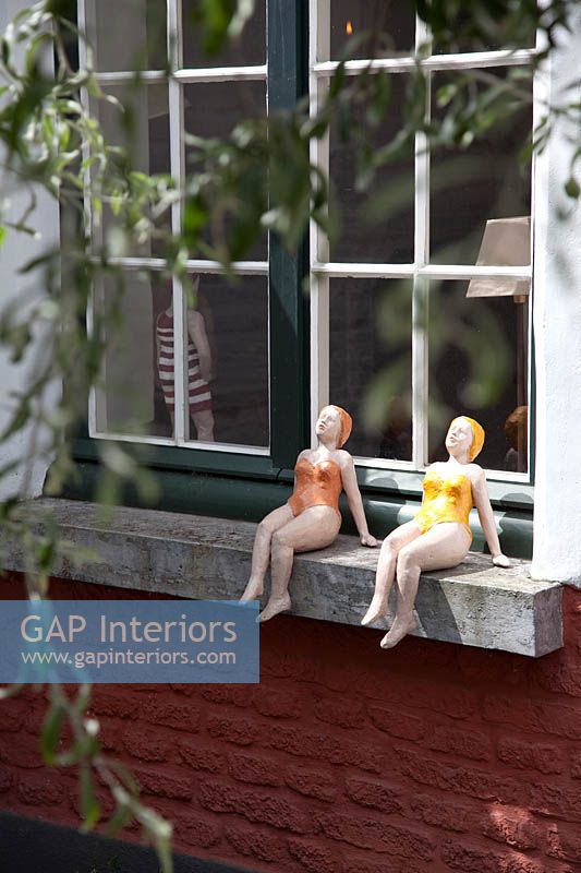 Sculptures on windowsill