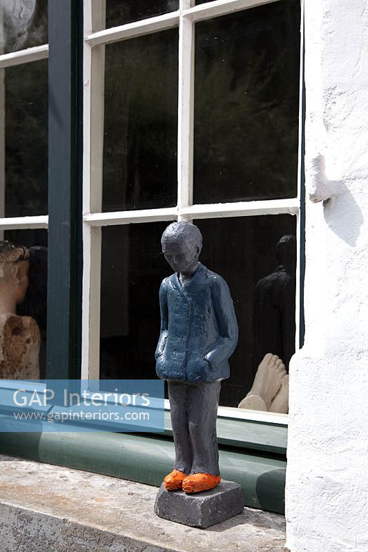 Sculpture on windowsill