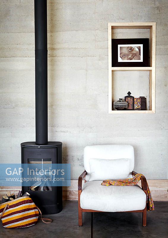 White armchair by stove