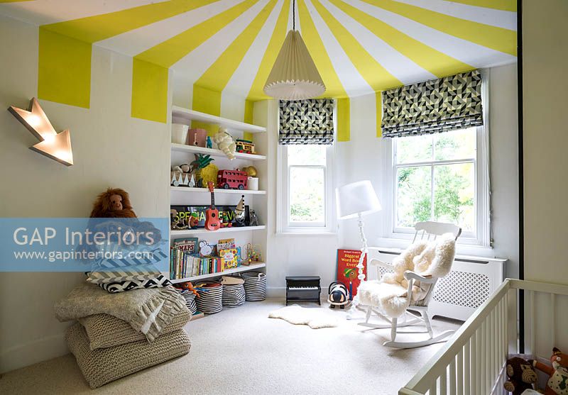 Childrens room with colourful ceiling