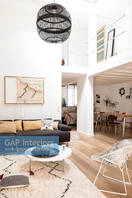 Modern open plan living space with mezzanine