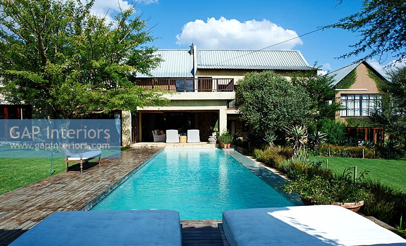 Modern house and garden with pool