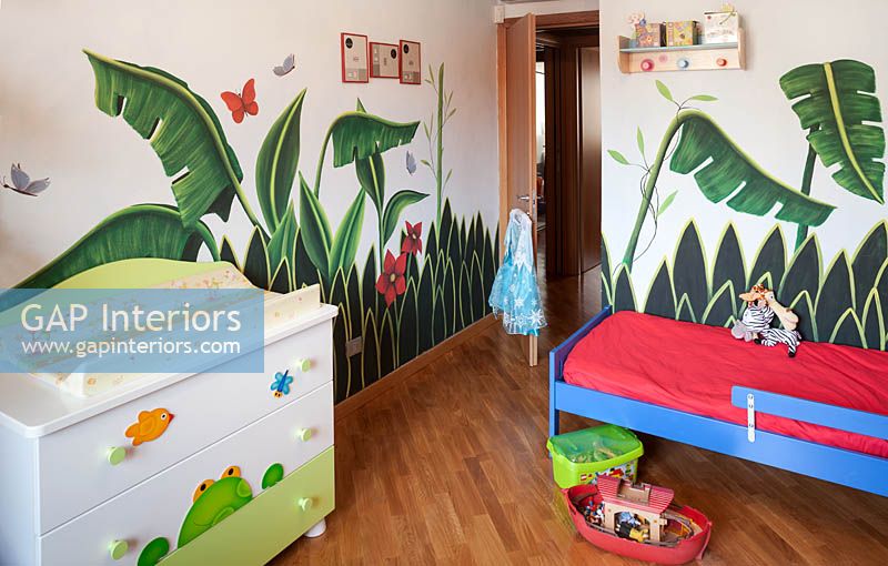 Childs bedroom with mural