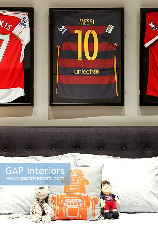 Childs bedroom with sports memorabilia