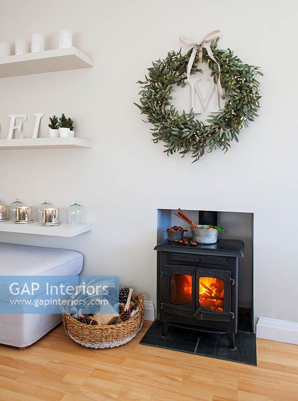 Mistletoe wreath above fireplace