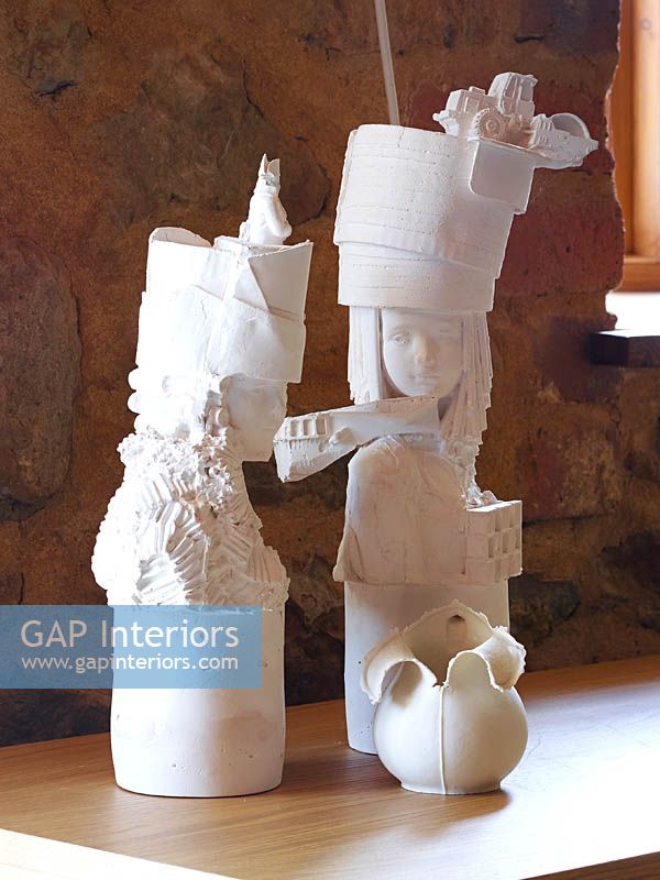 White ceramic sculptures by Kathy Dalwood with jug