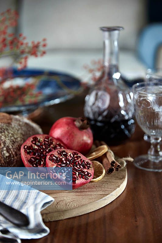 Pomegranates on wooden platter