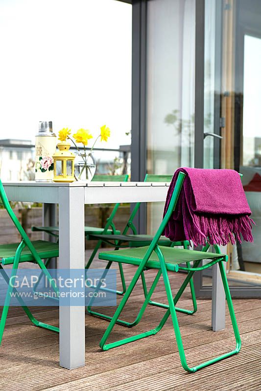 Colourful furniture on roof terrace