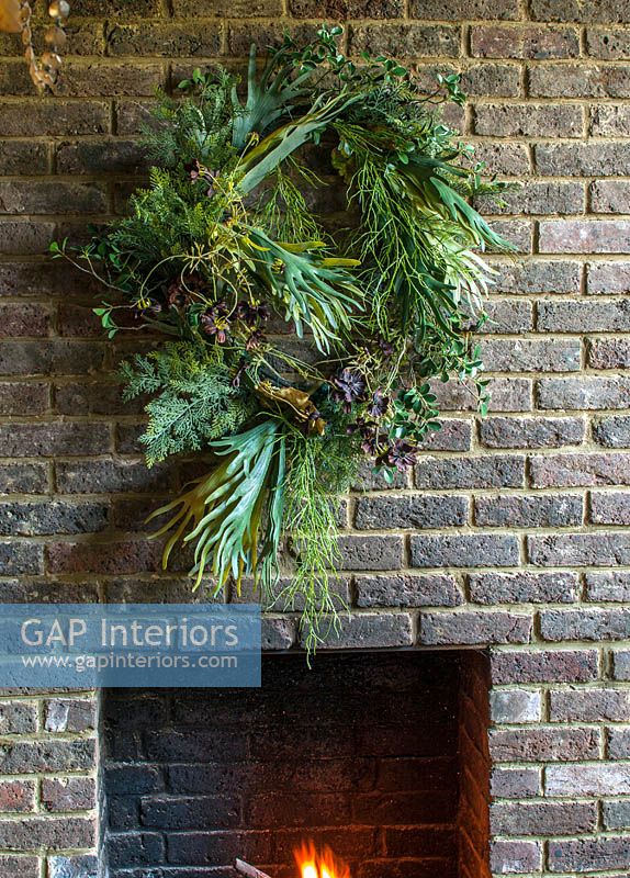 Wreath above fireplace