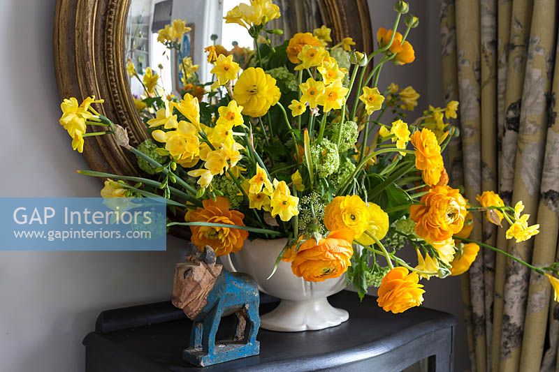 Vase of Ranunculus and Narcissus flowers