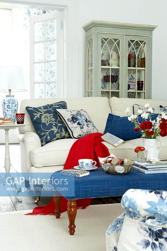 Colourful soft furnishings on sofa