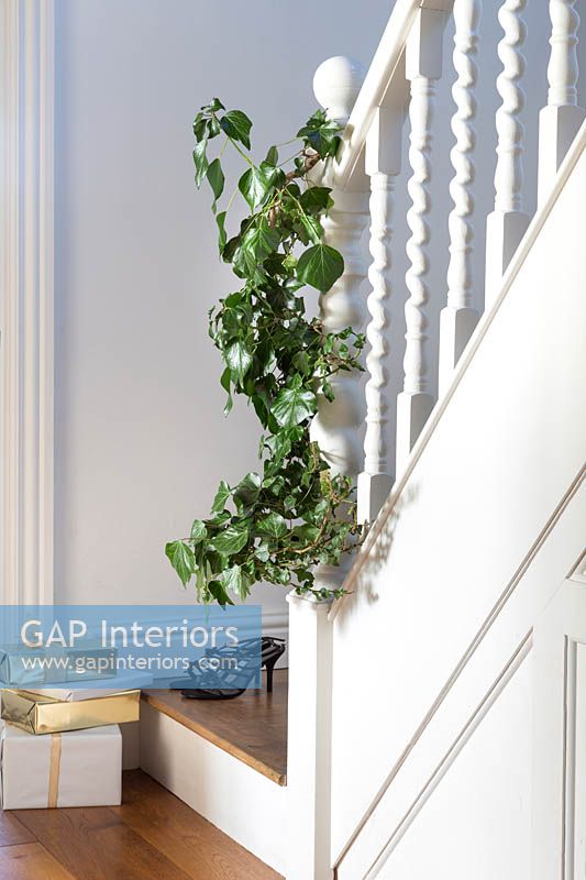 Ivy foliage wrapped around bannister
