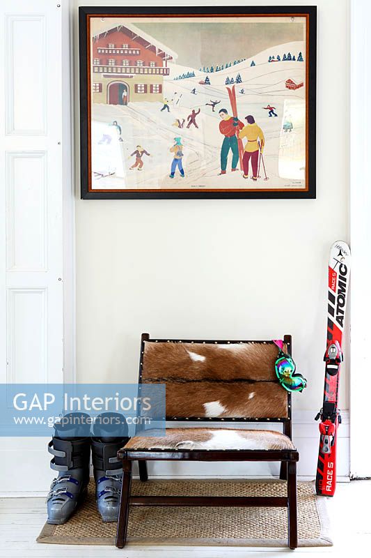 Winter sports equipment on chair