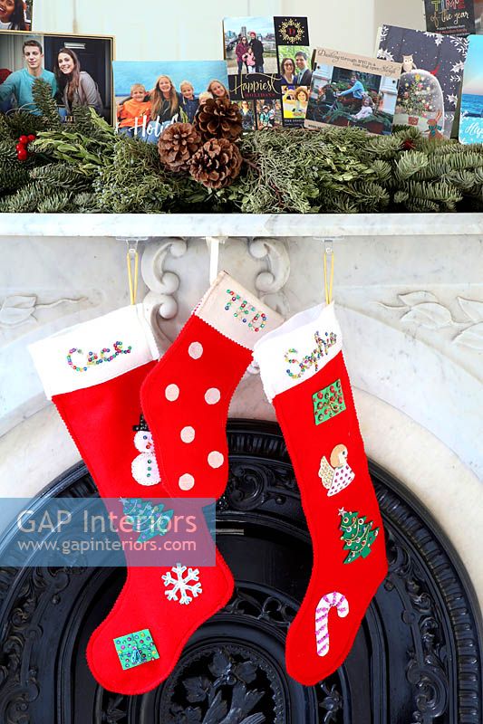 Christmas decorations around fireplace