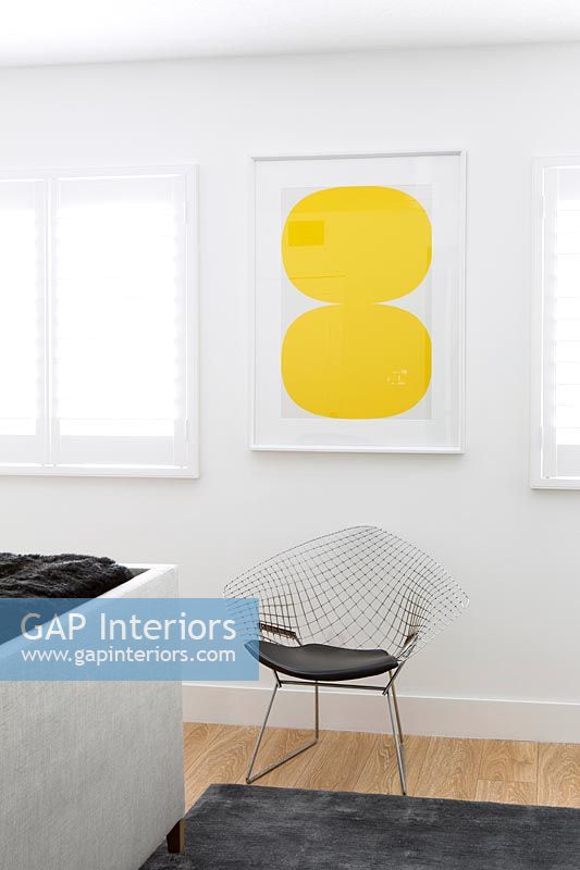 Designer chair and abstract painting