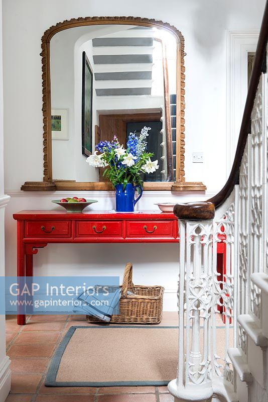 Red cabinet in hallway