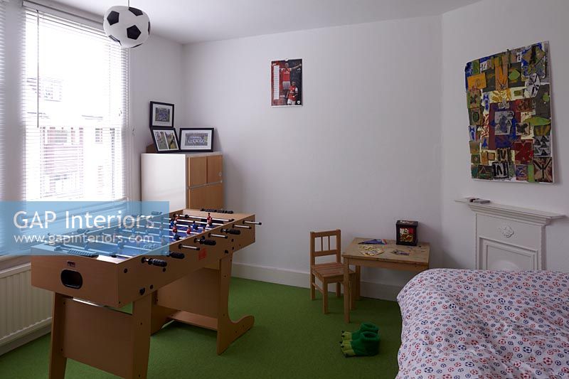 Childs bedroom with football table