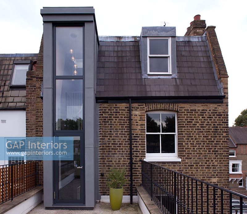 Traditional house with contemporary extension