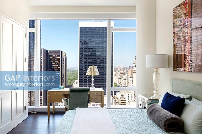 Modern bedroom with city views