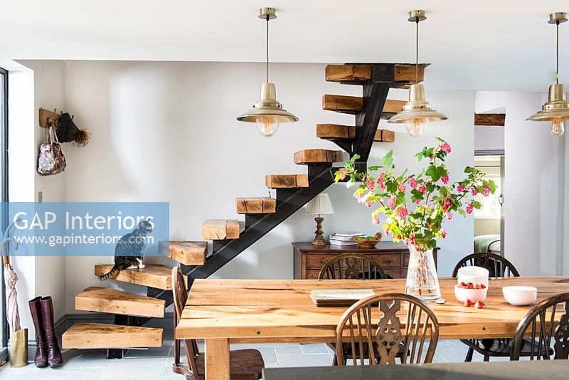 Modern staircase in dining room