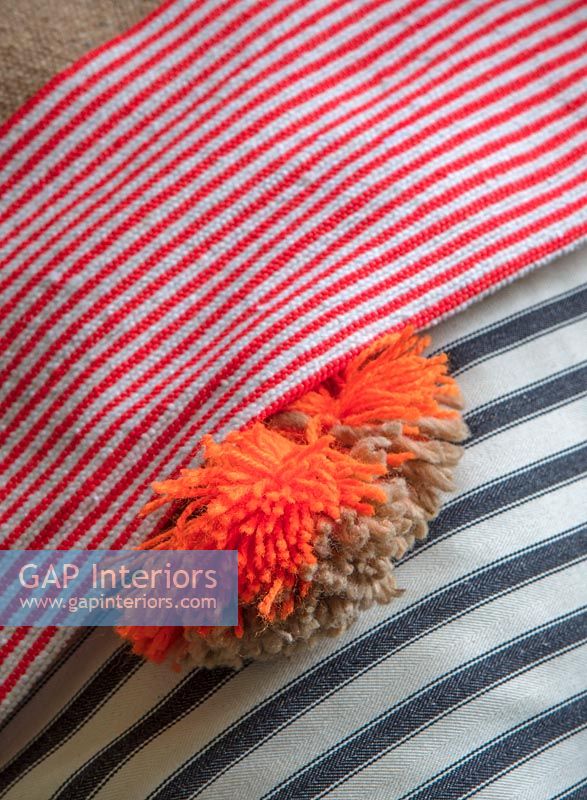 Blanket with Pompom detail