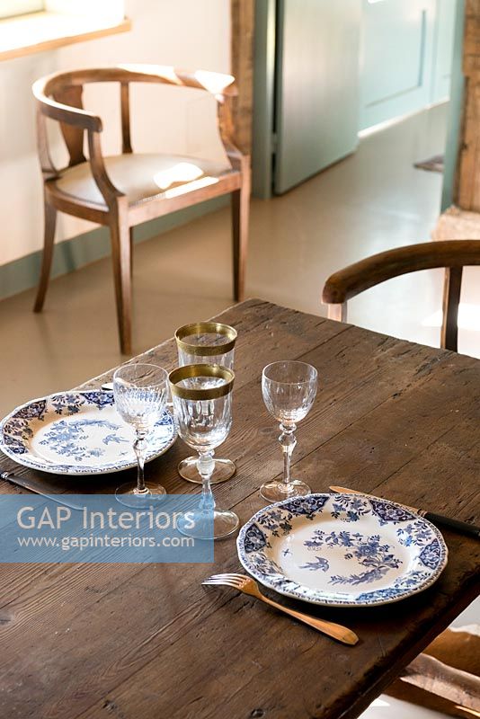 Patterned plates on dining table