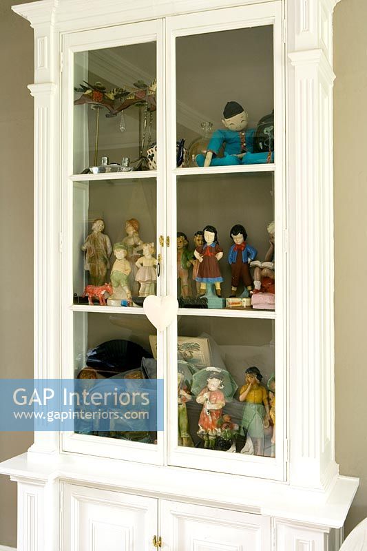 Figurines in display cabinet