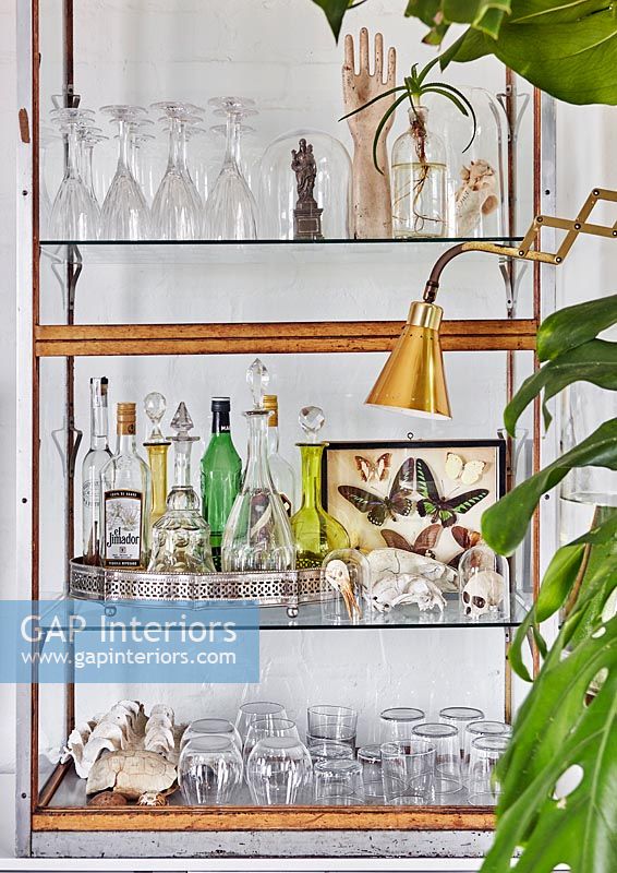 Glassware on metal shelves