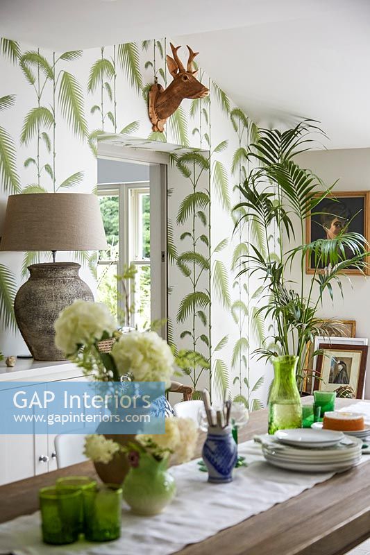 Patterned wallpaper in dining area