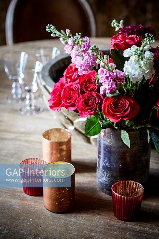 Vase of Roses on dining table