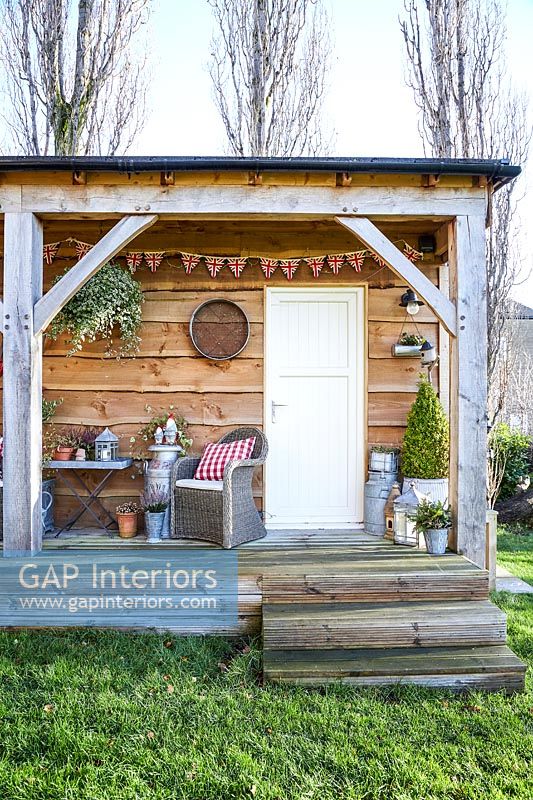 Wooden summerhouse with christmas decorations