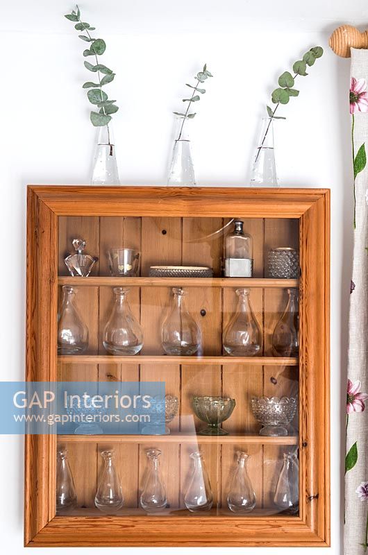 Glassware in display cabinet