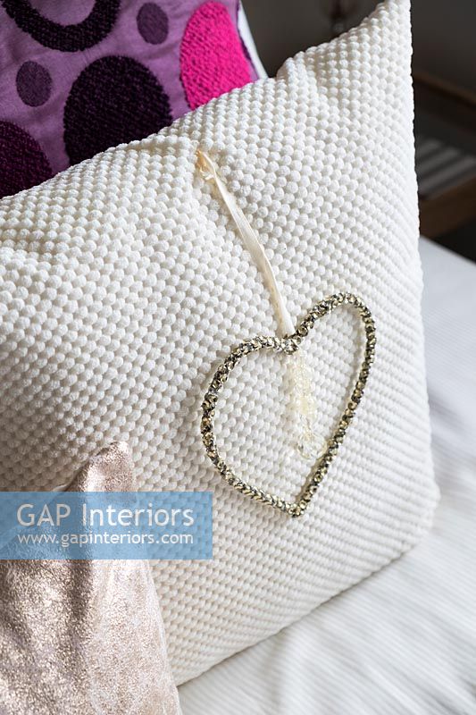Cushion with heart detail