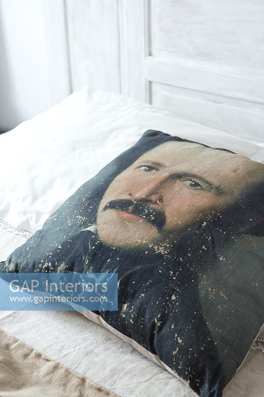 Detail of portrait print on cushion 