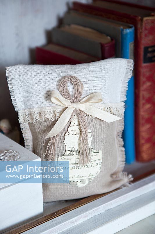 Detail of fabric bag and books
