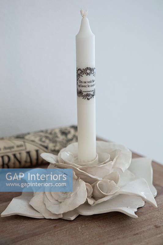 Candle in decorative holder