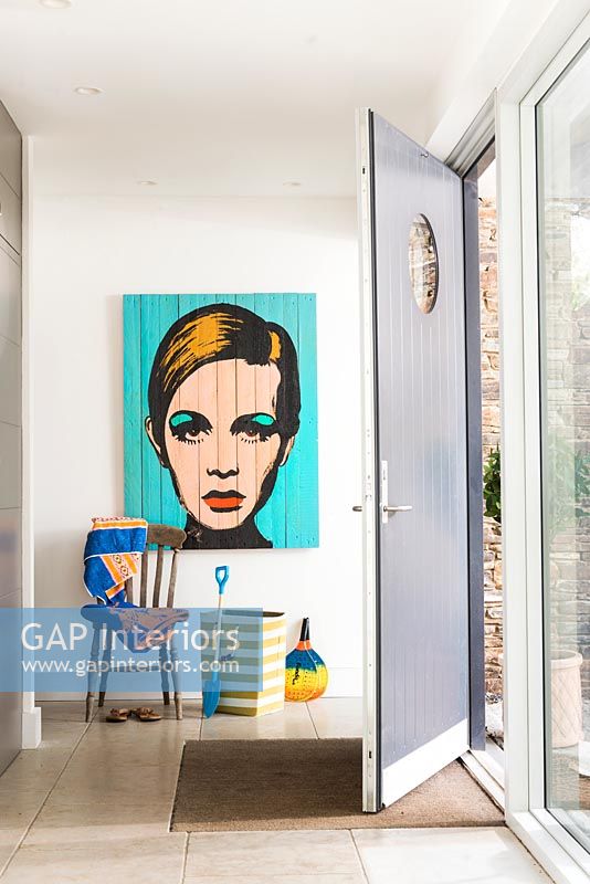 Colourful artwork in modern entrance hall