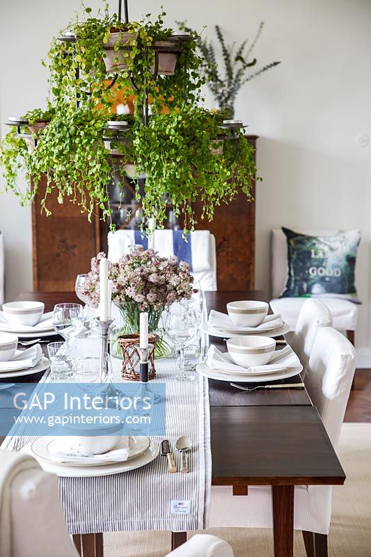 Classic dining room with decorative foliage 