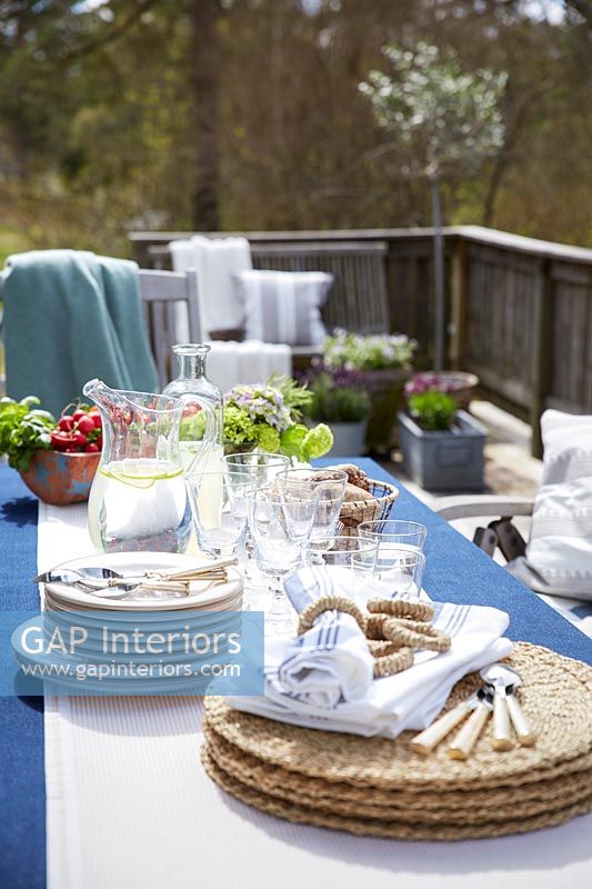 Outside dining table set ready for entertaining